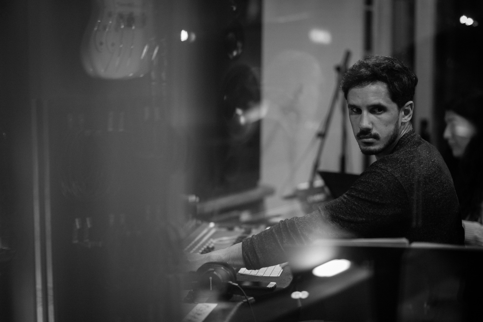 Edu Prado at the mixing console, looking over his shoulder